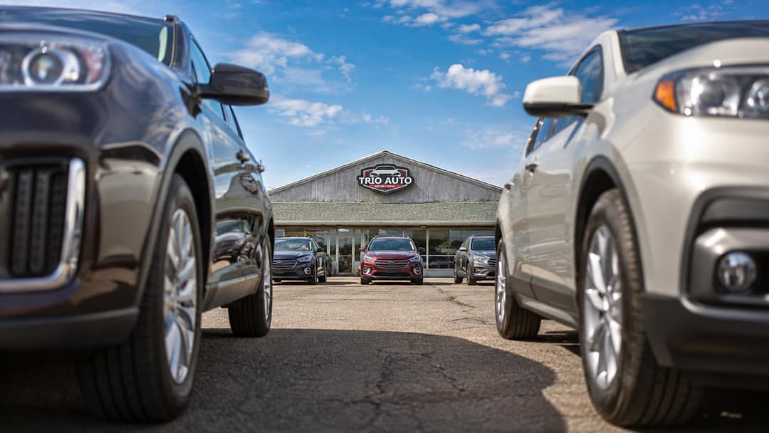 Used vehicles on the lot at Trio Auto in Elyria, Ohio